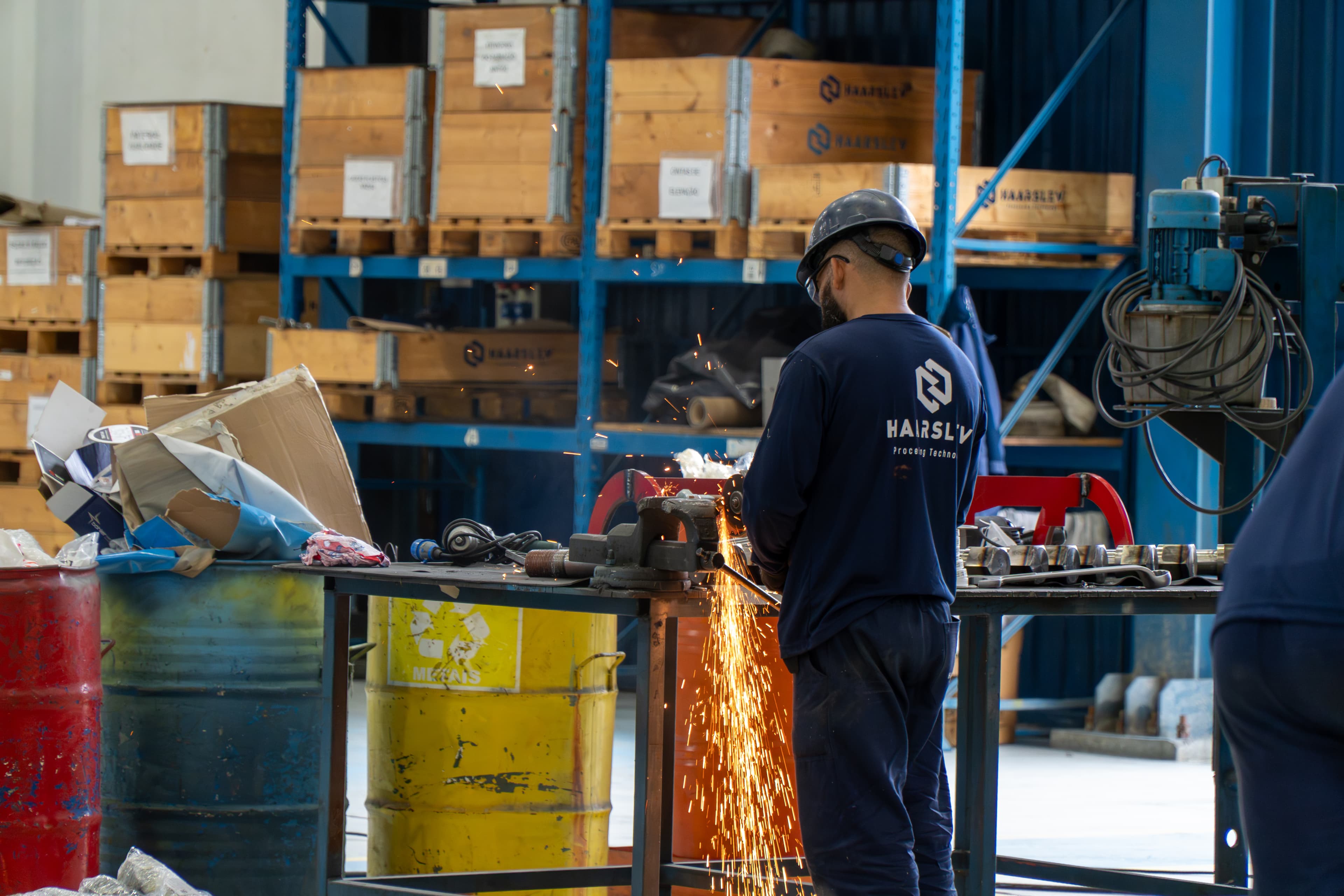 Haarslev service technician at work in a processing plant